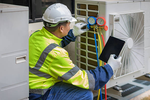 Professional Hvac technician working in Calverton, NY